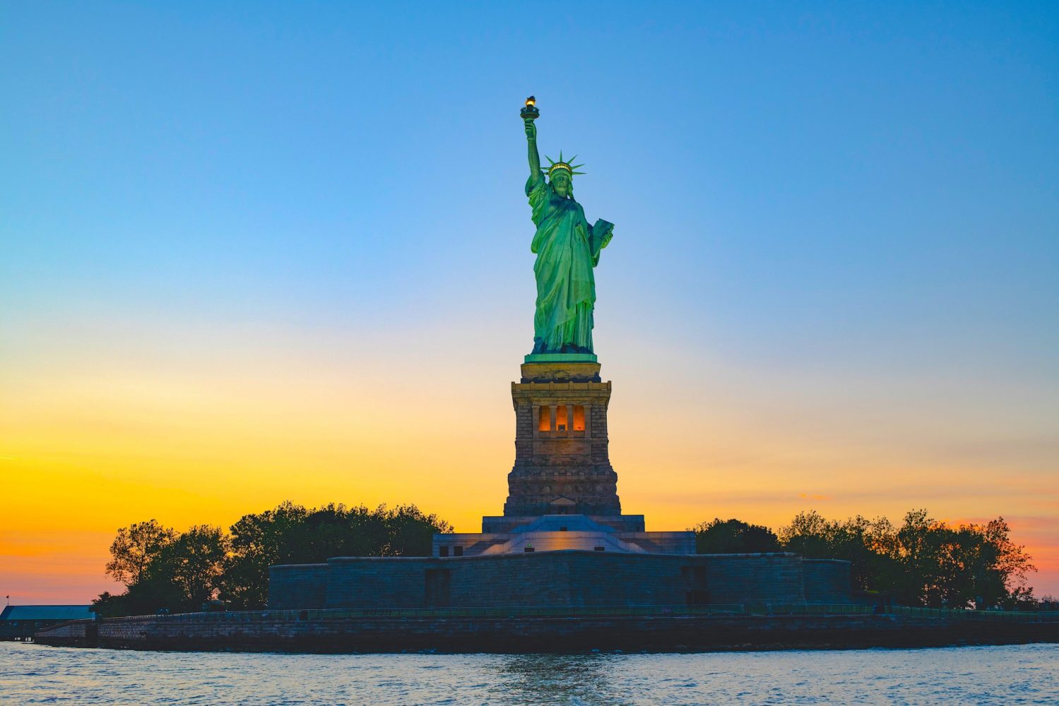 Statue of Liberty at sunset in NYC