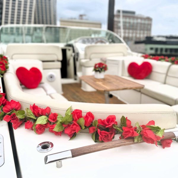 red rose garlands on a romantic date night boat ride in NYC