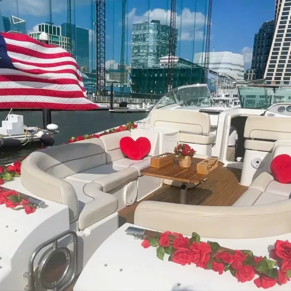romantic boat cruise decorated with red rose garlands and American Flag at Chelsea Piers